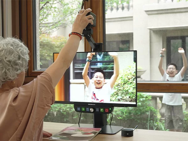 2025 Low Vision Tech Trends- zoomax luna eye lightweight desktop magnifier view outdoor scenery