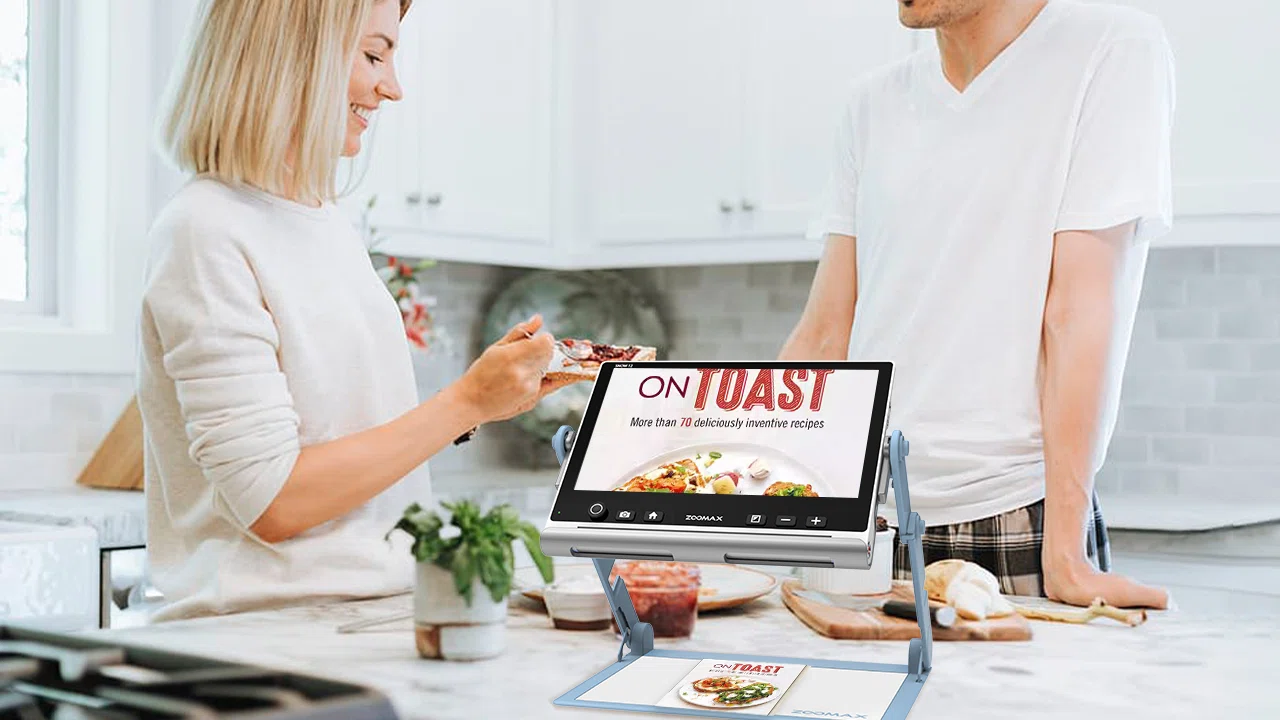 zoomax snow 12 low vision electronic magnifier used to read a recipe book in the kitchen all scene vision adaptability